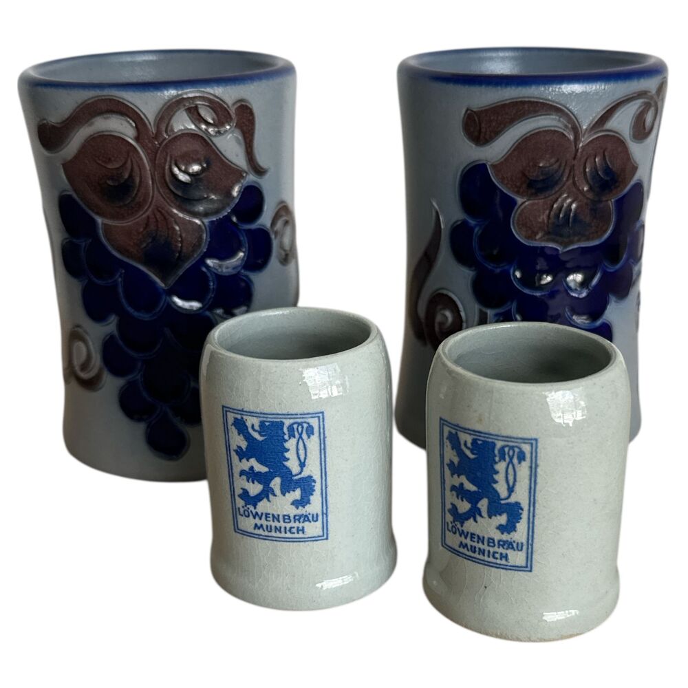 Lot of 4 Mini German Beer Stein Shot Glasses Löwenbräu & Grape Relief Design